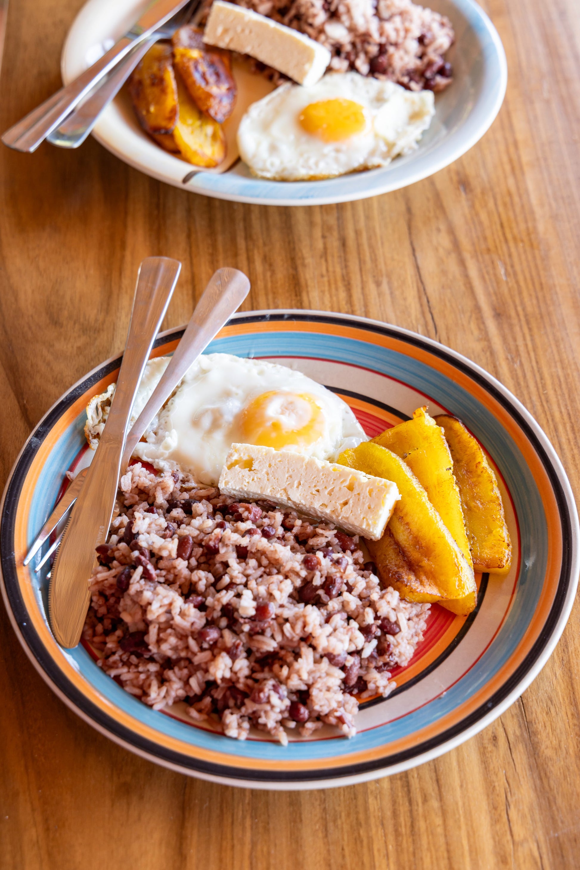 Nicaraguan breakfast with gallo pinto, egg, cheese and plantain