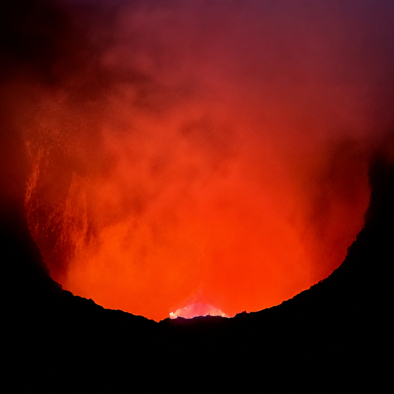 Glowing crater at Masaya Volcano photographed during a Driftwood guest visit